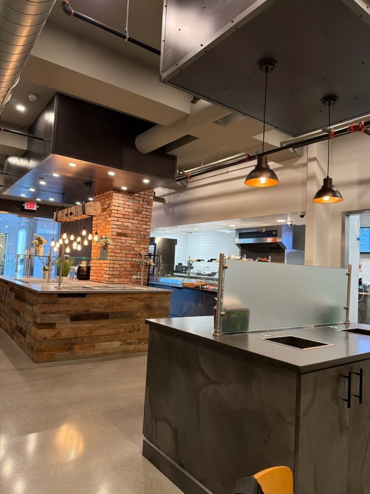 Restaurant interior with pendant and accent lighting installed by J.B.R.