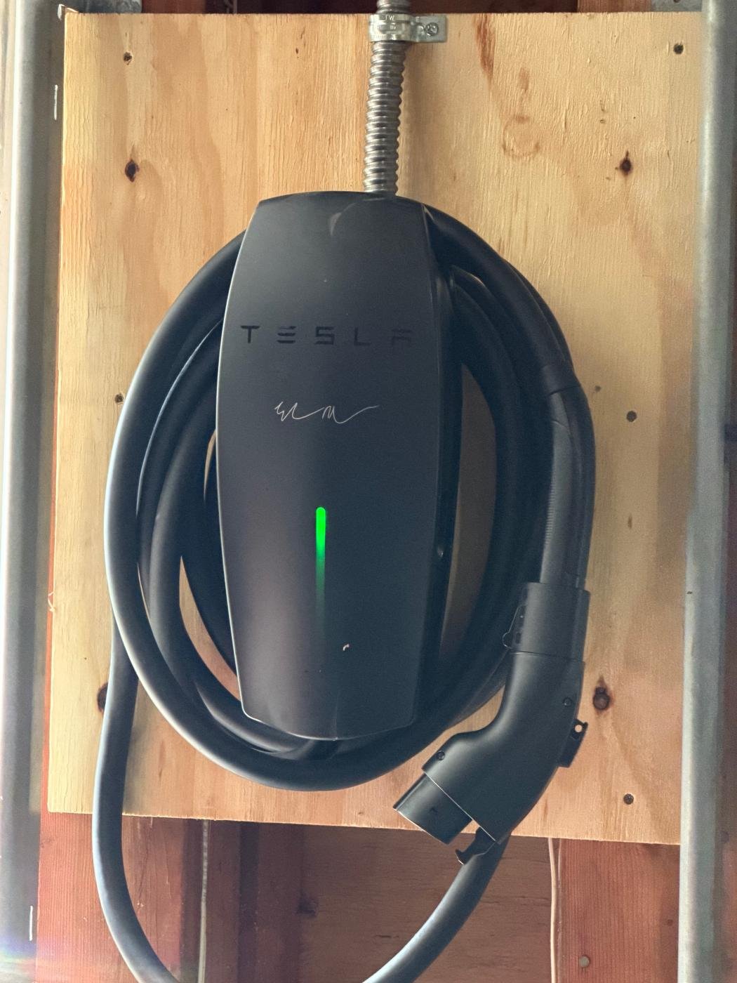 Tesla Wall Connector installed by J.B.R. in a home garage